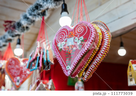 Heart shaped candy at the Christmas stand in the street Heart shaped candy at the Christmas stand in the street 111773039