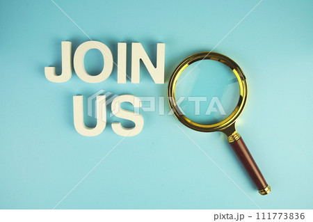 Join Us alphabet letters with magnifying glass on blue background Join Us alphabet letters with magnifying glass on blue background 111773836