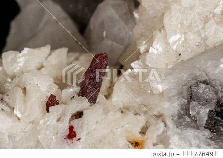 Macro stone Cinnabar dolomite mineral on a black background 111776491