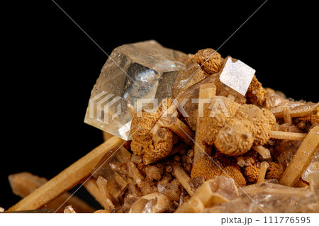 Macro stone mineral Fluorite on a black background Macro stone mineral Fluorite on a black background 111776595