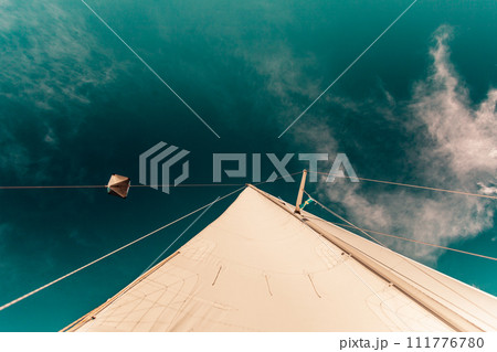 Detailed closeup of sail on sailboat Detailed closeup of sail on sailboat 111776780