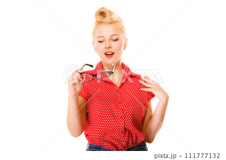 beautiful girl retro hairstyle holds glasses isolated 111777132