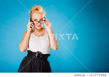 Pin up retro gril with glasses and phone. Pin up retro gril with glasses and phone. 111777268