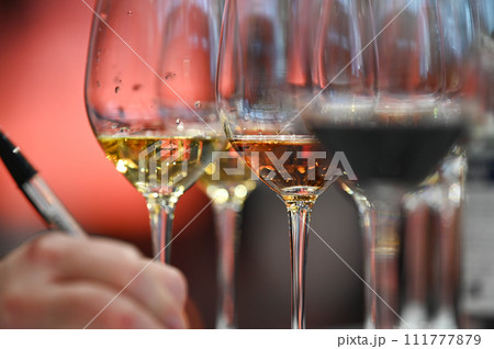 Glasses with wine, Red, pink, white wine in glasses. set of glasses with red, white and rose wine 111777879
