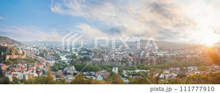 Panoramic landscape of old Tbilisi on the background of spectacular blue sky with clouds 111777910