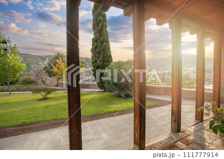 Beautiful landscape of sunny Tbilisi on the background of blue cloudy sky 111777914