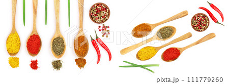 mix of spices in wooden spoon isolated on a white background. Top view. Flat lay. Set or collection 111779260
