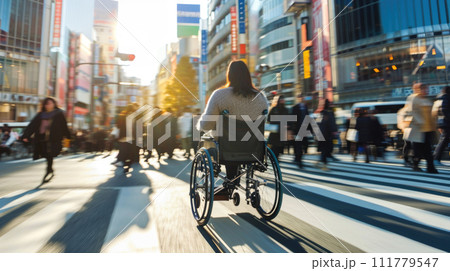 Woman Crossing Street in Wheelchair 111779547