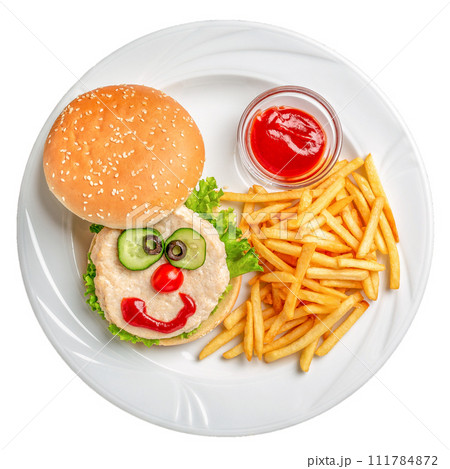 kids menu, french fries with cutlet on plate. funny food face tasty burger isolated on white background 111784872