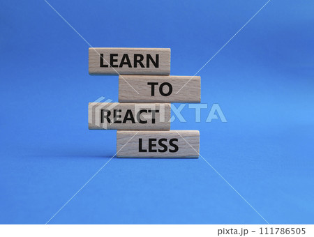 Learn to react Less symbol. Wooden blocks with words Learn to react Less. Businessman hand. Beautiful blue background. Business and Learn to react Less. Copy space. Learn to react Less symbol. Wooden blocks with words Learn to react Less. Businessman hand. Beautiful blue background. Business and Learn to react Less. Copy space. 111786505