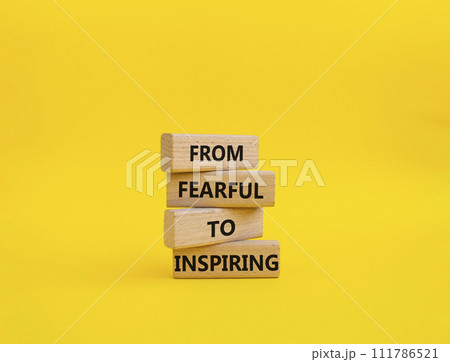 From Fearful to Inspiring symbol. Concept words From Fearful to Inspiring on wooden blocks. Beautiful yellow background. Business and From Fearful to Inspiring concept. Copy space. From Fearful to Inspiring symbol. Concept words From Fearful to Inspiring on wooden blocks. Beautiful yellow background. Business and From Fearful to Inspiring concept. Copy space. 111786521