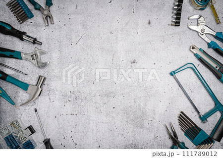 Set of tools on concrete background, Set of tools on concrete background, 111789012