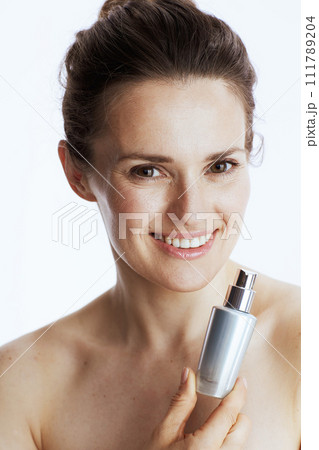 happy modern woman with cosmetic cream jar 111789204