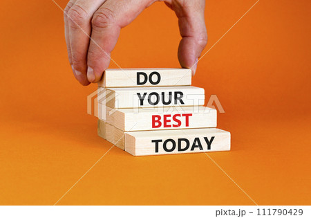 Do your best today symbol. Concept words Do your best today on beautiful wooden block. Beautiful orange table background. Businessman hand. Business motivational do your best today concept. Copy space Do your best today symbol. Concept words Do your best today on beautiful wooden block. Beautiful orange table background. Businessman hand. Business motivational do your best today concept. Copy space 111790429