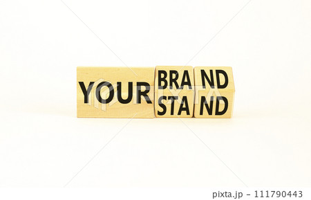 Branding your brand or stand symbol. Concept words Your stand Your brand on beautiful blocks. Beautiful white table white background. Business branding your brand or stand concept. Copy space. 111790443