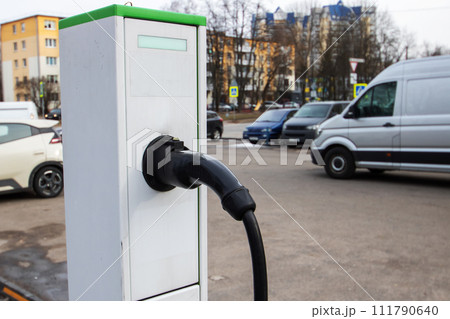 Electric Vehicle Charging Station at parking closeup 111790640