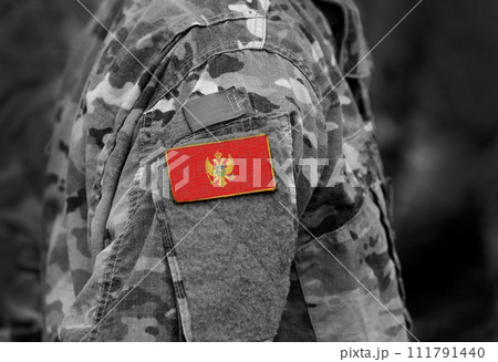 Montenegro flag on soldiers arm (collage). 111791440