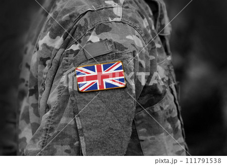 Flag of United Kingdom on soldiers arm. Flag of UK on military uniforms (collage). Flag of United Kingdom on soldiers arm. Flag of UK on military uniforms (collage). 111791538
