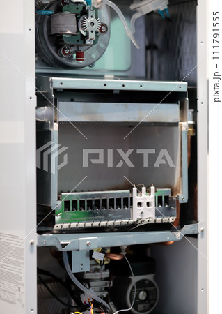 open wall mounted natural gas room heater close up open wall mounted natural gas room heater close up 111791555