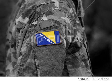 Flag of Bosnia and Herzegovina on soldiers arm (collage). Flag of Bosnia and Herzegovina on soldiers arm (collage). 111791568