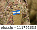 Flag of Nicaragua on soldiers arm (collage). 111791638