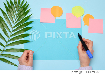 Blank rectangular sheet of paper on a blue background 111793690