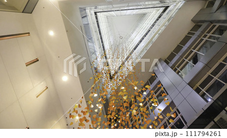 Large window on the ceiling, great transparent glass on the roof in luxury hotel, modern architecture, luxurious contemporary construction creative design concept Large window on the ceiling, great transparent glass on the roof in luxury hotel, modern architecture, luxurious contemporary construction creative design concept 111794261