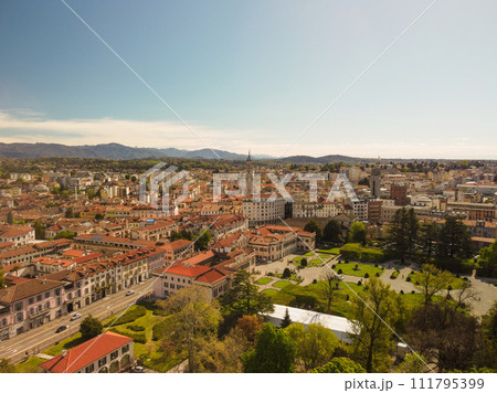 VARESE, ITALY - MAY 12, 2023: woman next to the Lebanon Cedar tree in the Esten 111795399