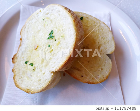 bread with parsley on the plate 111797489