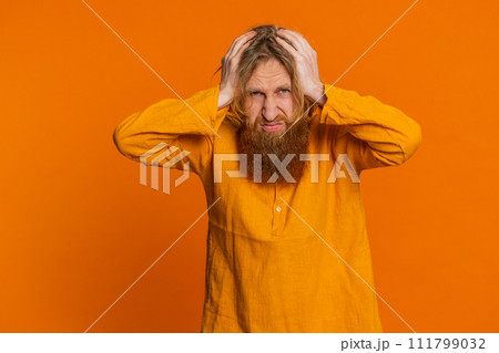 Sad Caucasian man loses becoming surprised by lottery results, bad fortune loss unlucky fortune news 111799032