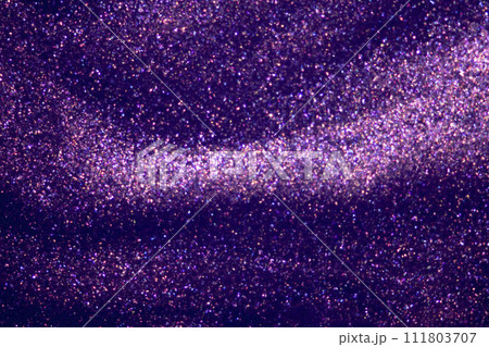 purple  glitter dust on dark background. 111803707
