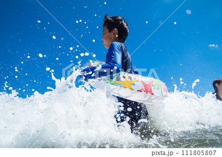 Ocean bathing 111805807