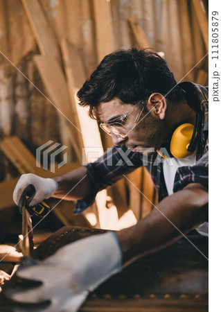 professional carpenter man hand working make wooden handcraft furniture master workpiece fine detail artisan with wood workshop. 111805879