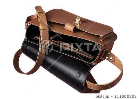 Brown briefcase bag made of genuine leather on a white background. Brown briefcase bag made of genuine leather on a white background. 111808385
