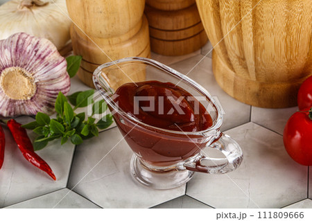 Tasty barbecue sauce in the bowl 111809666