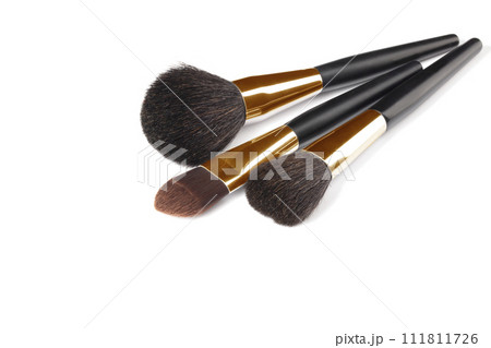 Cosmetic brushes for applying makeup. Makeup artist accessories isolated on white background.  111811726