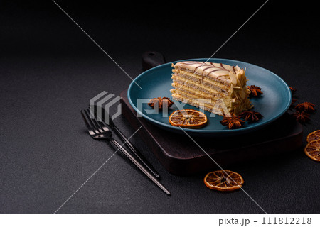 Piece of delicious sweet esterhazy cake with nuts and cream 111812218