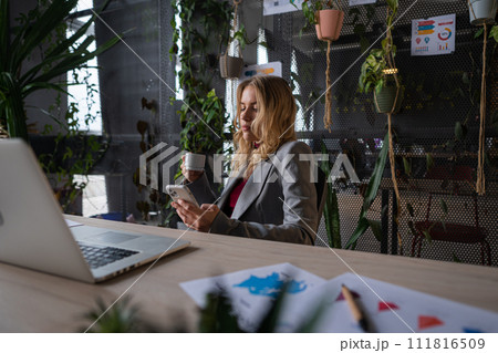 Professional at Work: White-collar Worker Using Computer in Office Professional at Work: White-collar Worker Using Computer in Office 111816509