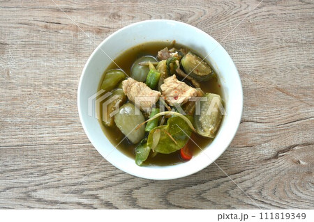 hot and spicy wild boar with variety vegetable and Thai herbs soup on bowl hot and spicy wild boar with variety vegetable and Thai herbs soup on bowl 111819349
