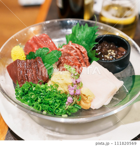 horse meat pieces sashimi or Japanese Basashi. Baniku includes lean meat, superb marbling, mane and liver. Premium meat and famous food in Matsumoto city, Nagano Prefecture, Japan 111820569