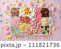 Easter sweet charcuterie board with chocolate eggs on pink background. Top view. 111821736