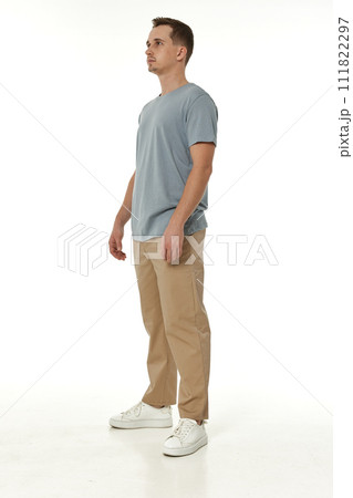 handsome young calm man on white background 111822297