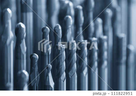 Close-up scene the group of used cutter end mill tools. Close-up scene the group of used cutter end mill tools. 111822951