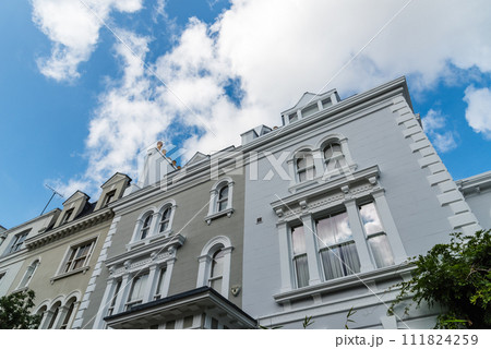 Traditional houses in Notting Hill neighborhood in London 111824259