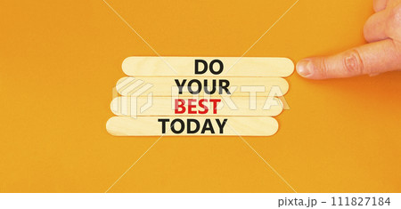 Do your best today symbol. Concept words Do your best today on wooden stick. Beautiful orange table orange background. Businessman hand. Business motivational do your best today concept. Copy space. Do your best today symbol. Concept words Do your best today on wooden stick. Beautiful orange table orange background. Businessman hand. Business motivational do your best today concept. Copy space. 111827184