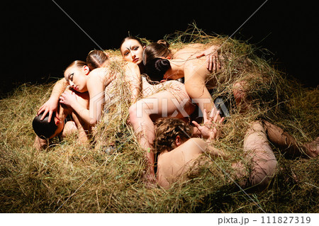 Group of modern ballet dancers. Contemporary art. Young flexible athletic men and women. 111827319