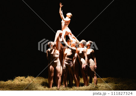 Group of modern ballet dancers. Contemporary art. Young flexible athletic men and women. 111827324