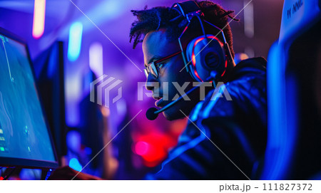 eSports competitive gamer in the heat of intense gameplay 111827372