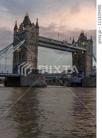 Scenery view of famous Tower bridge and skyline in the river thames at evening. 111830486