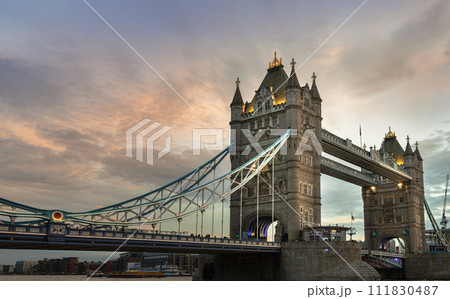 View of famous Tower bridge and skyline with reflections in the river thames just after sunset. View of famous Tower bridge and skyline with reflections in the river thames just after sunset. 111830487